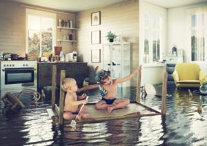 kids playing on the table while flooding in the kitchen.